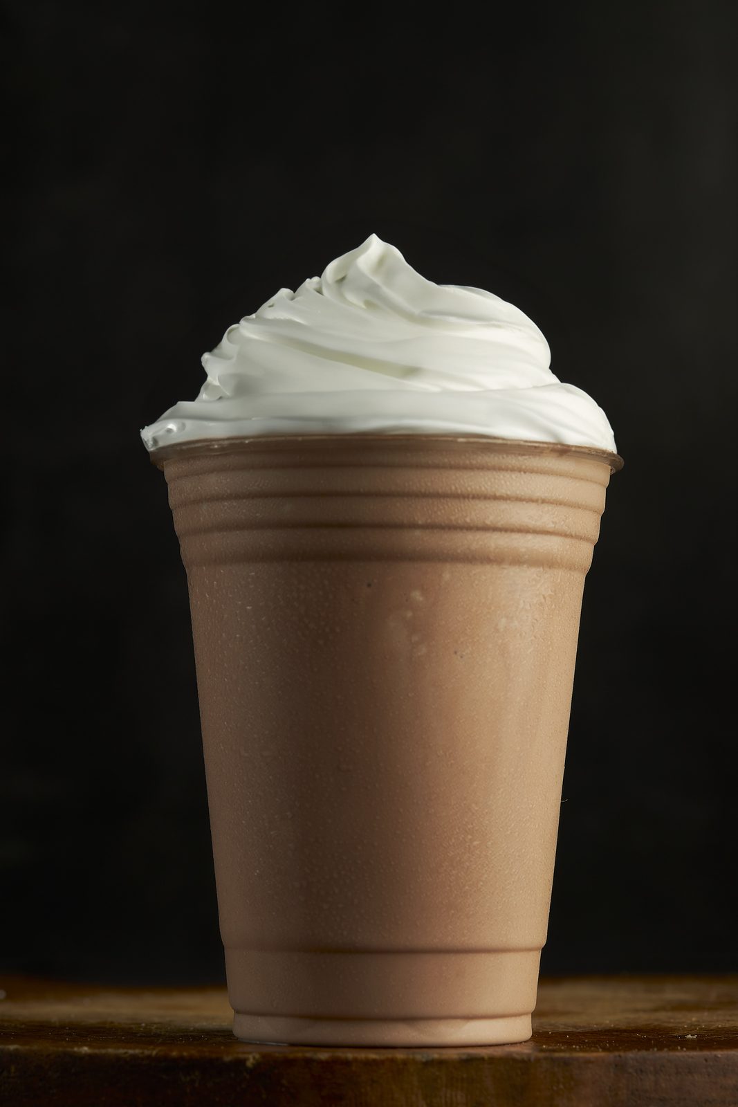 Thick chocolate milkshake topped with whipped cream