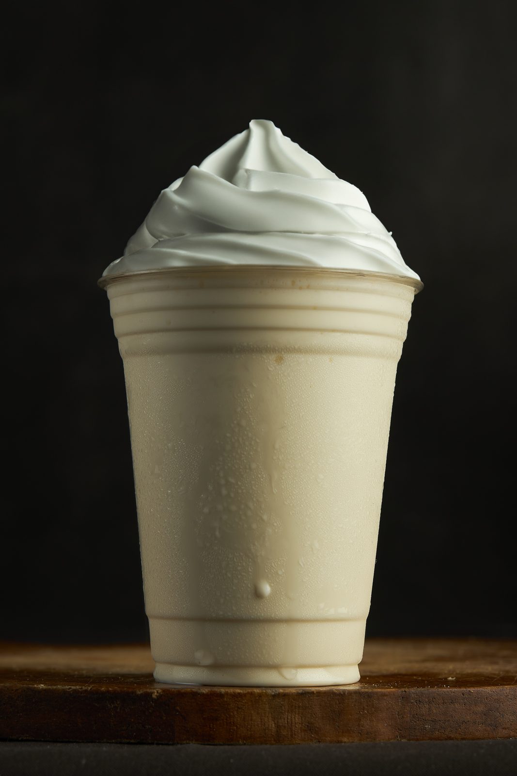 Vanilla milkshake topped with whipped cream